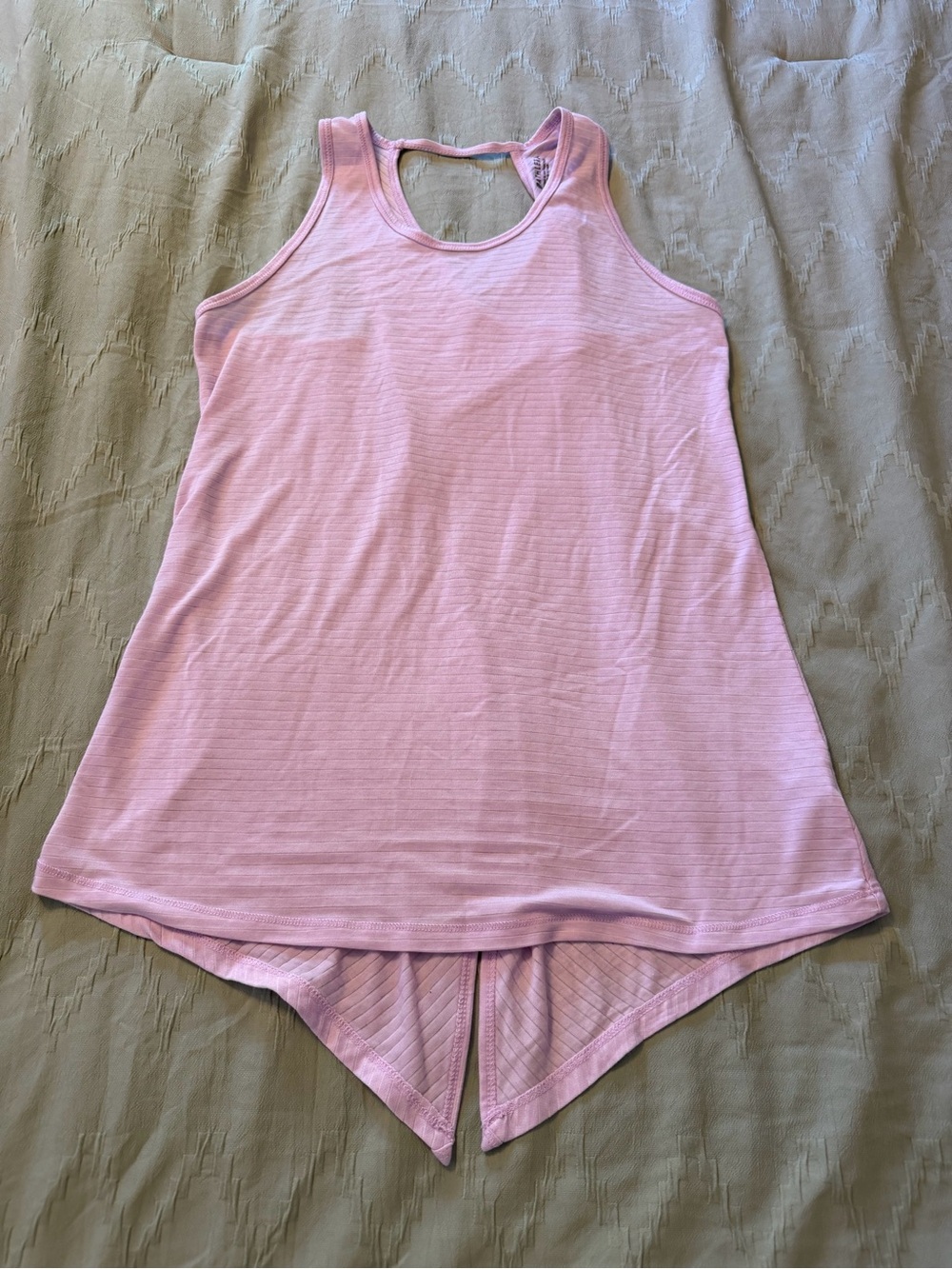 Athleta pink ribbed tank top with asymmetrical hem and open back Size XS